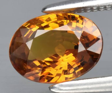 Enfes Oval Kesim Citrine Gemstone Parlak Yüzleriyle Ilık Altın Bal Renklerini Vurguluyor.