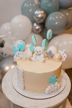 Adorable Teddy Bear Themed Birthday Cake with Balloons and Decorations. clipart