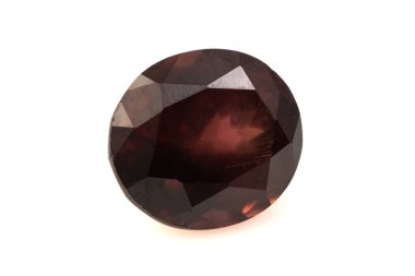 Exquisite Natural Zircon Gemstone with Rich Dark Hue and Faceted Brilliance. clipart