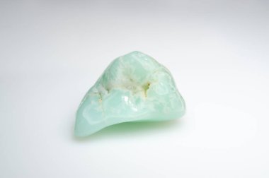 Natural Chrysoprase Gemstone with Unique Shape and Vibrant Color. clipart