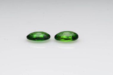 Exquisite Pair of Natural Green Tourmaline Gemstones Showcasing Exceptional Clarity and Brilliance. clipart