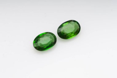 Stunning Natural Green Tourmaline Gemstones Displayed on a White Background. clipart