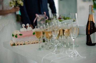 Elegant Wedding Reception with Champagne Glasses and Cake. clipart