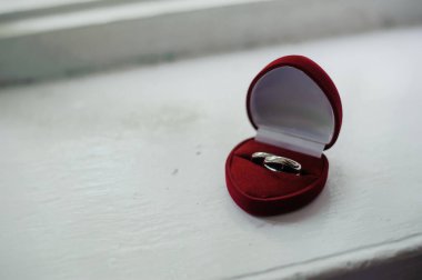 Elegant Silver Ring in a Red Velvet Display Box. clipart