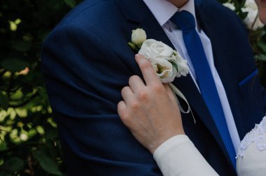 Intimate Wedding Moment Captured Amidst Nature. clipart