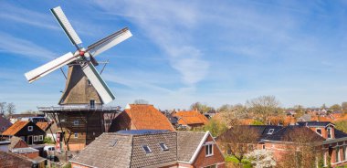 Panorama of the historic windmill in Winsum, Netherlands clipart