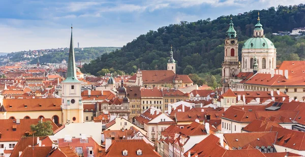stock image Panorama of church towers and rooftops in Prague, Czech Republic