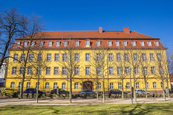 Stock image Historic yellow building at the park in Merseburg, Germany