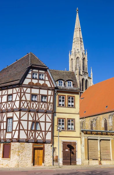 stock image Half timbered house and church tower in Merseburg, Germany