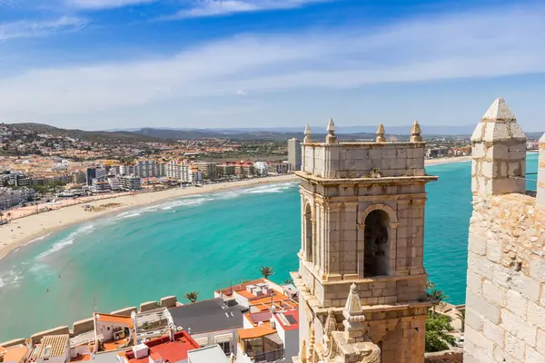 stock image Historic church tower overlooking the mediterranean sea in Peniscola, Spain