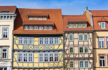 Colorful half timbered houses in the historic center of Muhlhausen, Germany clipart