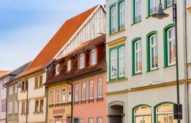 Colorful facades of the Untermarkt square in Muhlhausen, Germany clipart