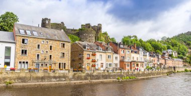 Panorama of the historic castle on the hill above the river in La Roche-en-Ardenne, Belgium clipart