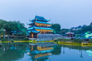 Pavillion in blue hour light in the Panmen scenic area in Suzhou, China clipart