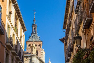 Tower of the San Martin church and houses in Segovia, Spain clipart