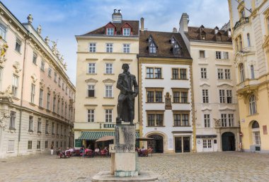 Lessing statue in the center of Judenplatz square in Vienna, Austria clipart