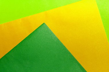 Three color, geometric, abstract green, yellow and light green colorful minimal textures of paper, background. This Season's Fashion Colors