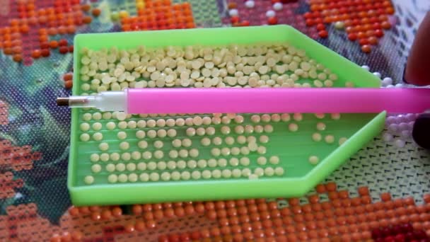 Girl Takes Pen Instrument Her Hand Which Lies Container Rhinestones — Stock Video