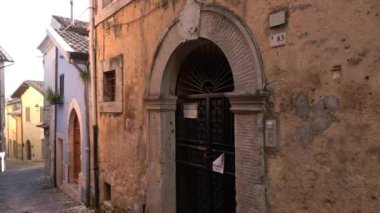 A narrow street in the historic center of Priverno, an old village in Lazio, not far from Rome, Italy.