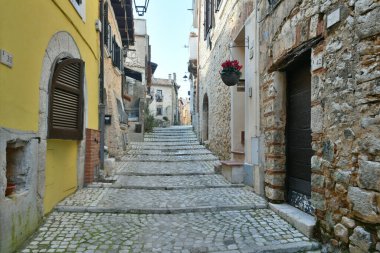 A narrow street in the historic center of Priverno, an old village in Lazio, not far from Rome, Italy.