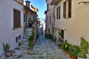 A narrow street in the historic center of Priverno, an old village in Lazio, not far from Rome, Italy.