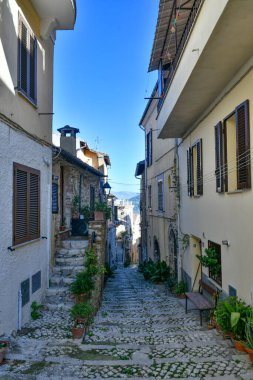 A narrow street in the historic center of Priverno, an old village in Lazio, not far from Rome, Italy.