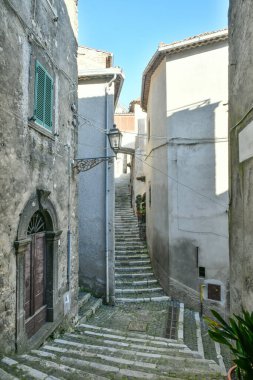 A narrow street in the historic center of Patrica, an old village in Lazio in the province of Frosinone, Italy.
