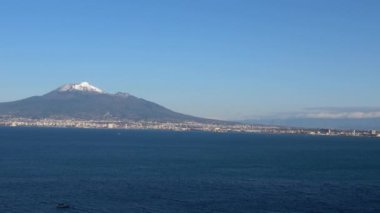 The Vesuvius volcano stands out over the gulf of Naples. Landscape from the town of Vico Equense, Italy.