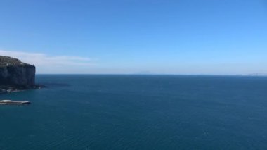 The Vesuvius volcano stands out over the gulf of Naples. Landscape from the town of Vico Equense, Italy.