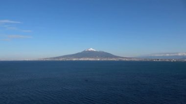 The Vesuvius volcano stands out over the gulf of Naples. Landscape from the town of Vico Equense.