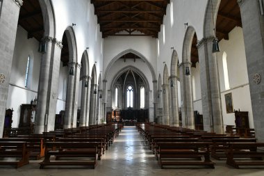 Arcades inside the cathedral of Lucera, an historic Apulian town, Italy