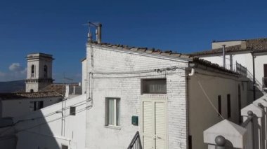 An alley among the old houses of Bovino, a rural town in the province of Foggia, Italy.