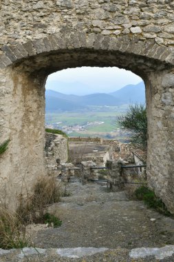 A narrow street among the old houses of Pietravairano, a rural town in the province of Caserta, Italy.