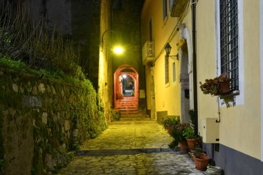 A narrow street among the old houses of Pietravairano, a rural town in the province of Caserta, Italy.