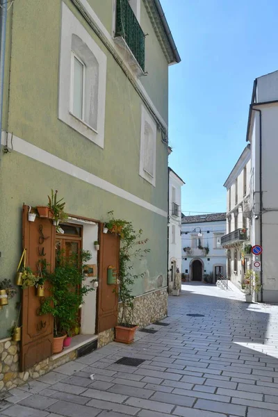 stock image A narrow street among the old houses of Larino, a medieval town in the province of Campobasso in Italy.