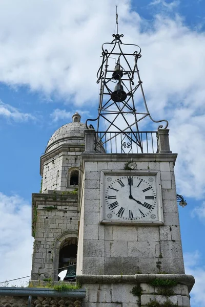 stock image The bell tower of the church of Nusco, a small mountain village in the province of Avellino, Italy.