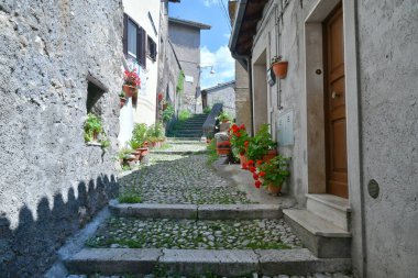 A narrow street in Subiaco, a medieval town near Rome, Italy. clipart
