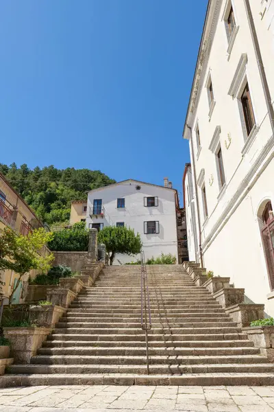 stock image A street between old houses in Carovilli, a village in Molise in Italy.