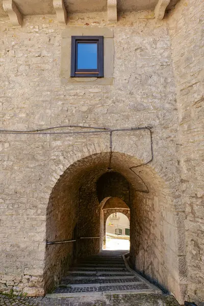 stock image A street between old houses in Vastogirardi, a village in Molise in Italy.