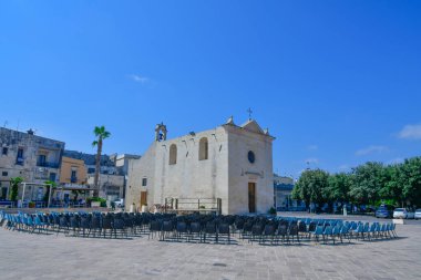  A square in the historic center of Martano, a tourist town in Puglia in Italy. clipart