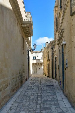 A street in the historic center of Martano, a tourist town in Puglia in Italy. clipart