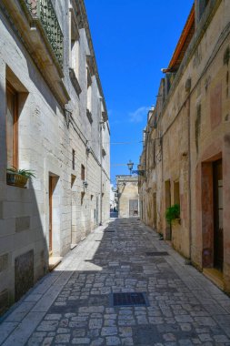 A street in the historic center of Martano, a tourist town in Puglia in Italy. clipart