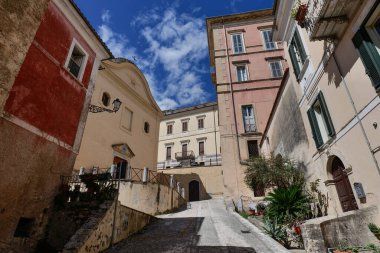 A street between the old houses of Alvito in Lazio, Italy. clipart