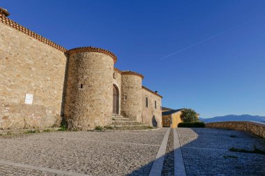 The walls of a medieval castle in Morra de Santis, a small town in Campania, Italy. clipart