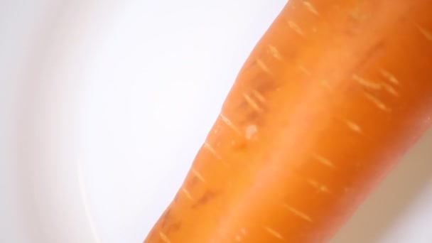 Καρότα Περιστρέφονται Φόντο — Αρχείο Βίντεο