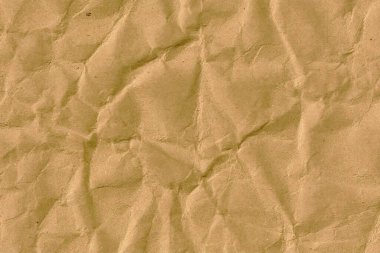 Kahverengi kraft kağıdı veya karton desenli eski kağıt dokusu. Soyut bej kaba karton desen, eski kağıt yaprak, parşömen ya da papirüs yüzeyi
