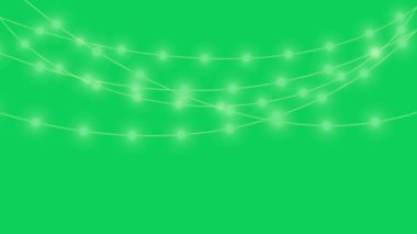 Yeşil ekran arkaplanındaki Noel sicim ışıkları
