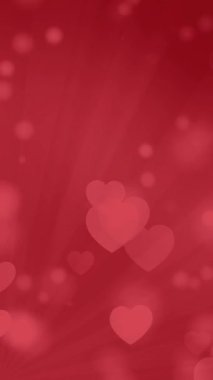 Döngü videosu, Sevgililer Günü için Red Hearts hareketi ve Bokeh Aşk Videosu. 4K Romantik Sevgililer Günü için koyu kırmızı arka planda döngü oluşturdu.