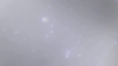 Yüksek Kalitede Parlayan Yıldızlar Efekti ile Gri Arkaplan Videosu