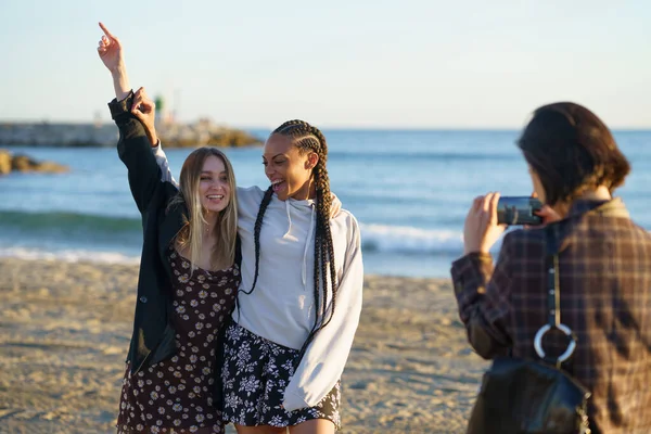 Unrecognizable Woman Smartphone Taking Photo Smiling Diverse Female Friends Standing — Stock Photo, Image